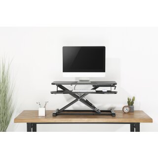 Height-adjustable sit-stand desk Desk attachment with gas pressure spring
